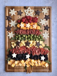 a wooden tray filled with different types of food