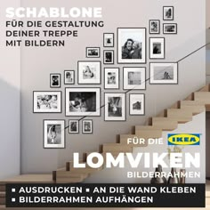 a staircase with pictures on the wall next to it and an ad for lomvien