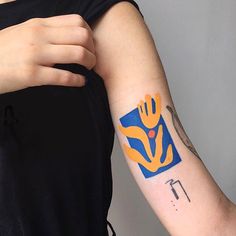 a person with a tattoo on their arm