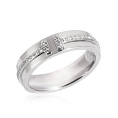 TIFFANY & Co. 18K White Gold 4.5mm Wide Diamond T Ring 5  Metal: 18K White Gold  Size: 5  Band Width: 4.5mm  Weight: 5.80 grams  Diamond: round brilliant diamonds, carat total weight .13   Hallmark: ©TIFFANY&Co. AU750 ITALY  Condition: Excellent condition, like new, comes with Tiffany box   Tiffany Price: $4,100 Authenticity Guaranteed Tiffany & Co, Tiffany And Co Rings, Tiffany And Co Ring, Rose Outfit, T Ring, Tiffany Ring, Tiffany Co Rings, Tiffany And Co Jewelry, Tiffany T