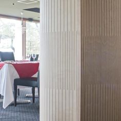 a dining room with tables and chairs in it