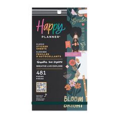 the happy planner book is open and has flowers on it