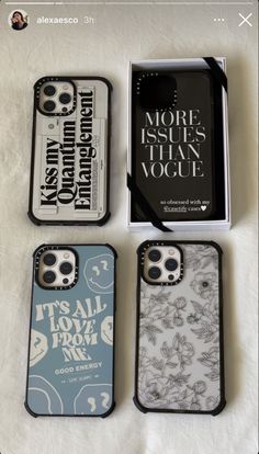 four iphone cases sitting next to each other on a white sheet with black and blue designs