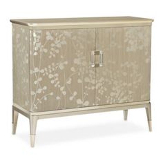 an image of a cabinet with flowers on the front and side doors in beige color