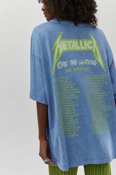 Tributing some of their best thrash tracks, Metallica revved up the adrenaline in their 1985 US Tour for their second studio album “Ride the Lightning.” Designed in colors that really pack a punch, with their logo left chest and tour details stamped on the back, this acid washed OS tee is a metal merch mega force. Ride The Lightning, Slouchy Tee, Oversized Graphic Tee, Tour Merch, Rap Tee, Blue Fits, Top Graphic Tees, Vintage Inspired Design, Tour Shirt