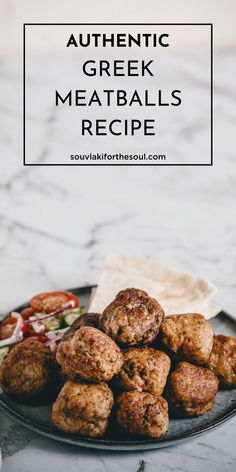 greek meatballs recipe on a plate with tomatoes and lettuce