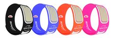 four different colored wristbands are lined up in a row on a white background