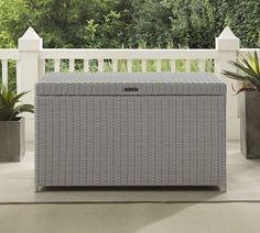 an outdoor storage box sitting on the patio