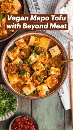 two bowls filled with tofu and rice next to chopsticks