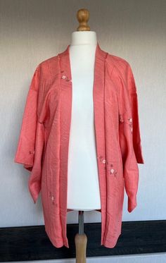 Description: Vintage Japanese kimono silk Jacket,  Haori jacket, short kimono, floral pink haori /0431 You can wear it as a jacket or a coat or a cape.  Material: silk  CARE :  dry clean recommended Size: approx. length 83cm  width 62cm  length  48.5cm  width  33cm  Condition: There are small stains on a liner.  This haori has a tacking thread which you can remove by yourself. SHIPPING: worldwide, WITH TRACKING. post NL or DHL. If the cost of shipping is FREE, the item will be DELIVERED TO THE S Pink Haori, Haori Jacket, Kimono Floral, Kimono Vintage, Vintage Japanese Kimono, Short Kimono, Silk Jacket, Vintage Kimono, Wooden Dolls