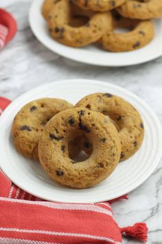 chocolate chip donuts on a white plate