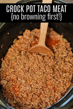 crock pot taco meat in a slow cooker with text overlay that reads crock pot taco meat no browning first