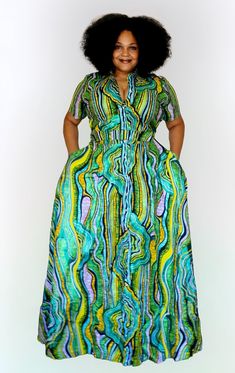 This is Ankara long dress with matching bag. Green Chiffon Maxi Dress, Green Maxi Dress For Casual Wear, Green Maxi Dress For Casual Occasions, Green Dress Down Maxi Dress, Elegant Multicolor A-line Maxi Dress, Multicolor Short Sleeve Evening Maxi Dress, Elegant Midi Dress With Pockets For Vacation, Chic Maxi Dress With Pockets For Party, Chic Party Maxi Dress With Pockets