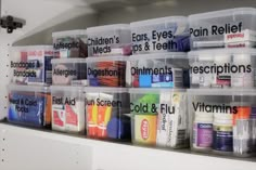 plastic containers filled with different types of toothpaste and mouthwashes on a shelf