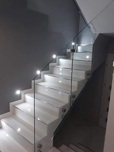 some white stairs with lights on them