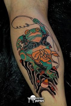 a frog with a fishing rod on his leg tattoo design for mens legs and feet