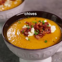 two bowls filled with soup and topped with bacon