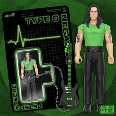 the action figure has a green shirt on and is next to a black guitar string