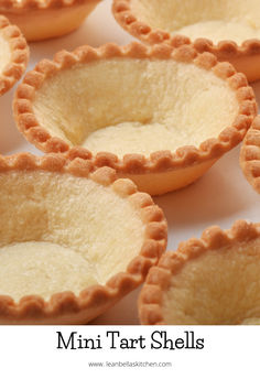 mini tart shells on a white surface with text overlay that says mini tart shells