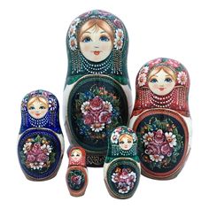 an assortment of russian nesting dolls in different colors and sizes, with flowers on them