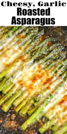 grilled asparagus with cheese and garlic on top