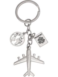 a metal key chain with an airplane charm