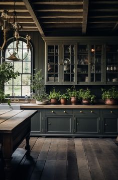 These moody farmhouse kitchen ideas feature a combination of rustic charm and dark, dramatic elements, creating a cozy space. #farmhouse #kitchen Gothic Kitchen Ideas, Moody Farmhouse, Moody Kitchen, Old World Kitchens, Gothic Kitchen, Farmhouse Kitchen Ideas, Farmhouse Style Kitchen, Design Del Prodotto, Cottage Kitchen