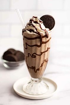 an ice cream sundae with oreo cookies on top