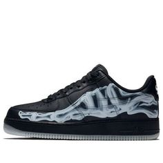 The Nike Air Force 1 07 Low Skeleton QS is the perfect shoe for Halloween. Dressed up in black leather with anatomical airbrushing for effect, this iteration of the iconic 1982 Nike hoops shoe glows in the dark, with its tarsal-bone graphics shining bright after the sun goes down. Bringing back the low-profile comfort of the original, it consists of supportive overlays, soft cushioning and durable rubber traction. Ideal for trick-or-treating, this shoe will make sure you stand out from the rest. (AF1/SNKR/Skate/Unisex/Low Top) Leather Custom Sneakers With Air Cushioning For Streetwear, Nike Air Force 1 With Translucent Outsole For Streetwear, Black Custom Sneakers With Translucent Outsole For Streetwear, Black Custom Synthetic Sneakers For Skateboarding, Black Synthetic Custom Sneakers For Skateboarding, Custom Black Synthetic Sneakers For Skateboarding, Custom Fade-resistant Leather Sneakers For Streetwear, Urban Black Custom Sneakers With Translucent Outsole, Black Leather Custom Sneakers With Air Cushioning