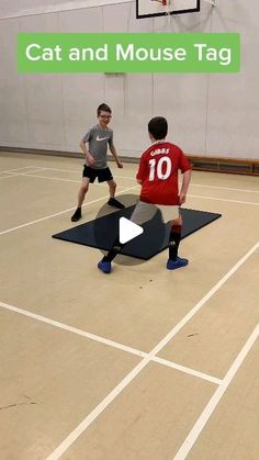 two men are playing basketball on an indoor court with the caption cat and mouse tag