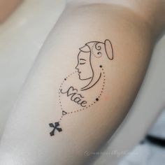 a woman's arm with a tattoo on it