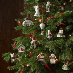 a christmas tree with ornaments hanging from it