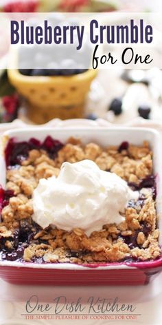 blueberry crumble for one with whipped cream on top