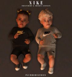 two small children wearing nike clothing and shorts