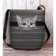 a black and white striped bag with a cat's face on it