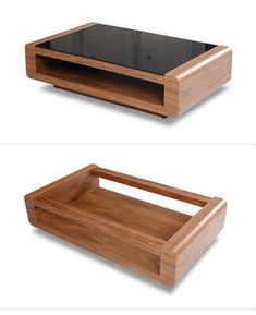 two wooden trays with black glass tops on each side and one in the middle