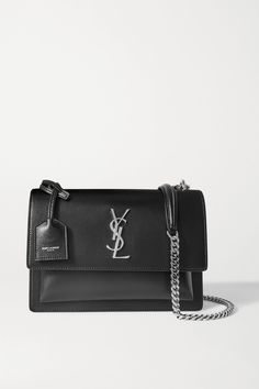 SAINT LAURENT's 'Sunset' bag has accordion sides, so it holds more than you'd first expect. It's been made in Italy from supple leather offset with a gleaming silver chain strap and matching 'YSL' plaque.Wear it with: [SAINT LAURENT Jeans id1161500], [SAINT LAURENT Jacket id1213674], [SAINT LAURENT T-shirt id1265069], [SAINT LAURENT Ankle boots id1265582]. Saint Laurent Jacket, Silver Bags