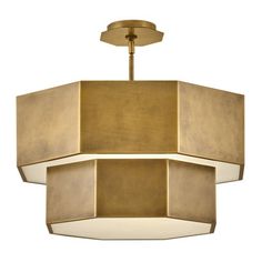 a large light fixture with a gold finish and white shades on the bottom half of it