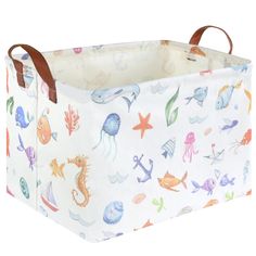 an ocean themed storage bin with handles