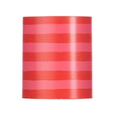 a pink and red striped lamp shade on a white background