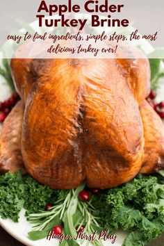 an apple cider turkey on a plate with kale and cranberries