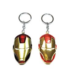 two iron man masks are hanging from the keychains on each other, one is red and one is gold