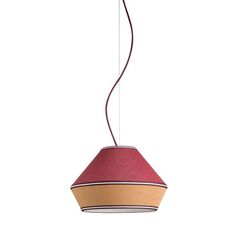 a red and tan lamp hanging from a ceiling