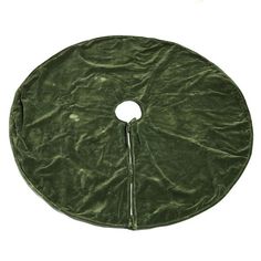 a green cloth covered with a hole in the middle