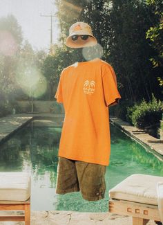 This exclusive collaboration has the perfect set of items needed to enjoy your day in the sun, from corduroy shorts, breathable graphic tee shirts, and lightweight jackets to accessories like a summer bucket hat and oversized beach tote bag. Each item has been custom dyed and washed to resemble a natural sun bleach. No summer style is complete without a luxury velour towel to add some comfort to your days. Shot by @victoriamoura, this campaign features Invisible Man photography techniques. Bucket Hat Outfit Mens, Beach Bucket Hat, Bucket Hat Outfit, Summer Bucket Hat, Garrett Leight, Orange Tees, Beach Tote Bag, Invisible Man, Man Photography