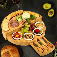 a wooden platter filled with different types of food