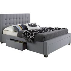 a gray bed with two drawers underneath it