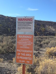 a warning sign in the middle of nowhere