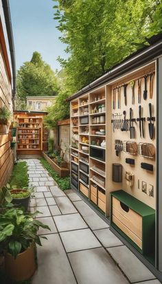 an outdoor garden with lots of gardening tools on the wall and shelves filled with plants