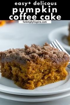 a piece of pumpkin coffee cake on a white plate with a fork next to it